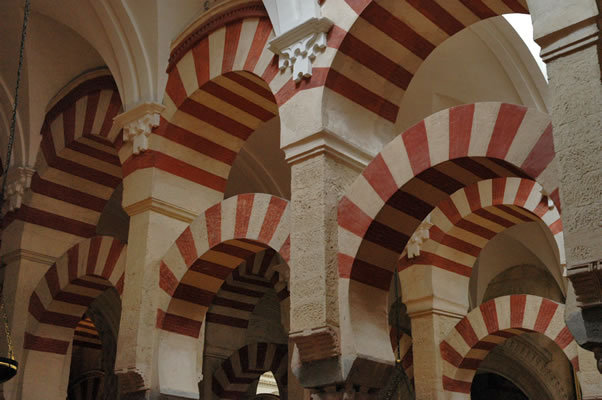 Double tiers of horseshoe and semi-circular arches in the Mosque-Cathedral (Mezquita) of Cordoba Spain